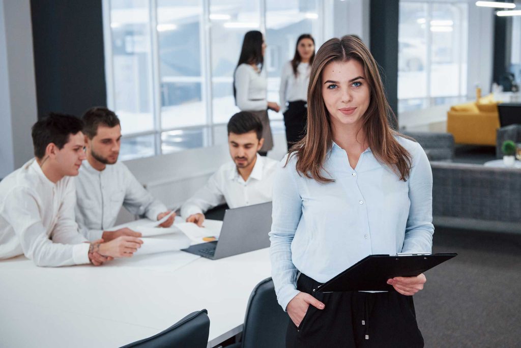 Pretty businesswoman portrait of young girl stand 2023 11 27 05 15 53 utc.jpg